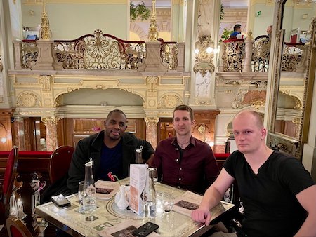 Me hanging out with new friends in Cafe New York in Budapest